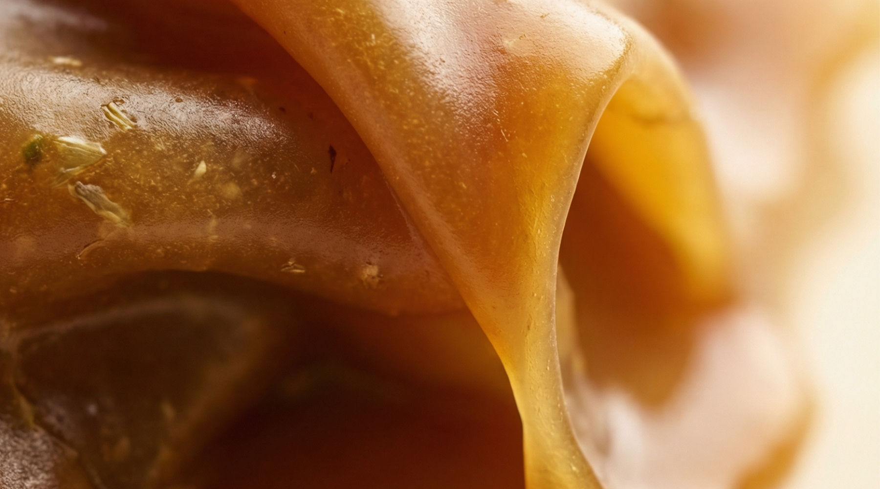 Raw propolis oil in sunlight