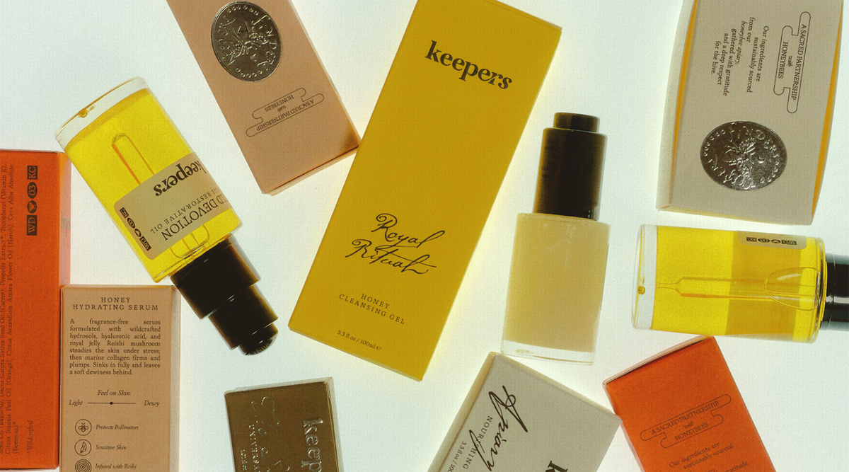 Skincare routine products and packaging laid on white table